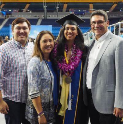 Courtney Rivera with her parents Ron and Stephanie Rivera, and her sibling Christopher Rivera at her graduation